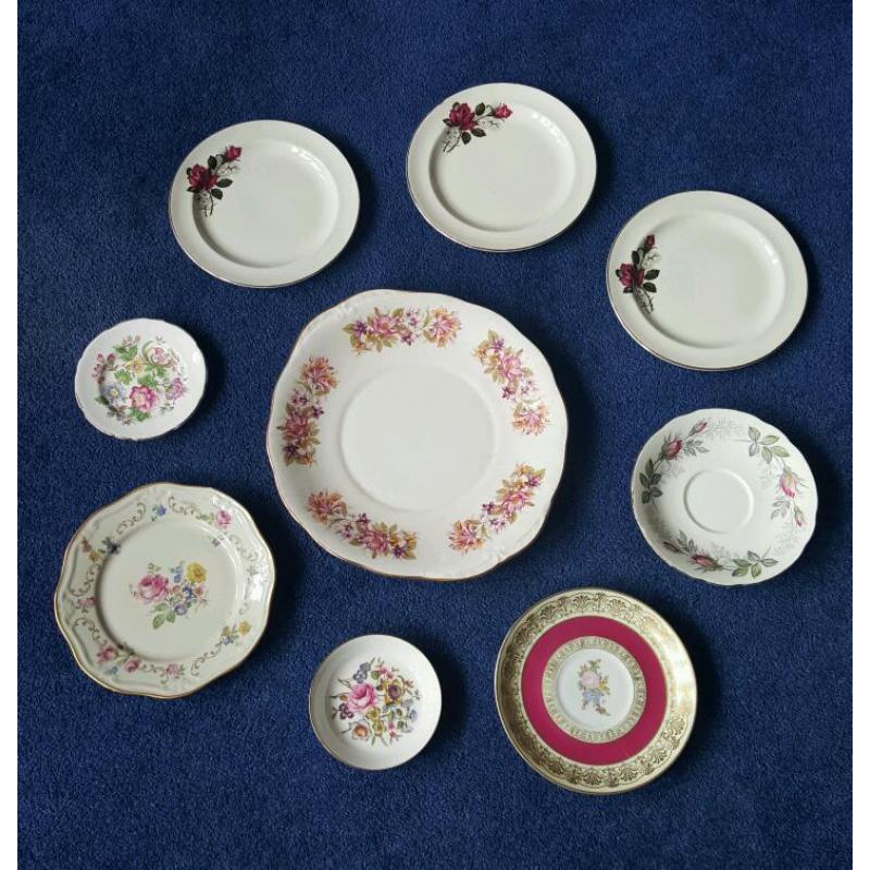 Assorted fine china plates different sizes