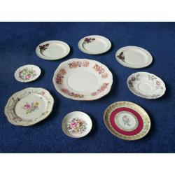 Assorted fine china plates different sizes