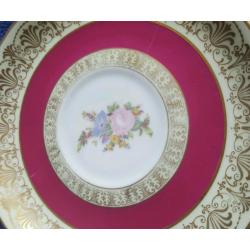 Assorted fine china plates different sizes