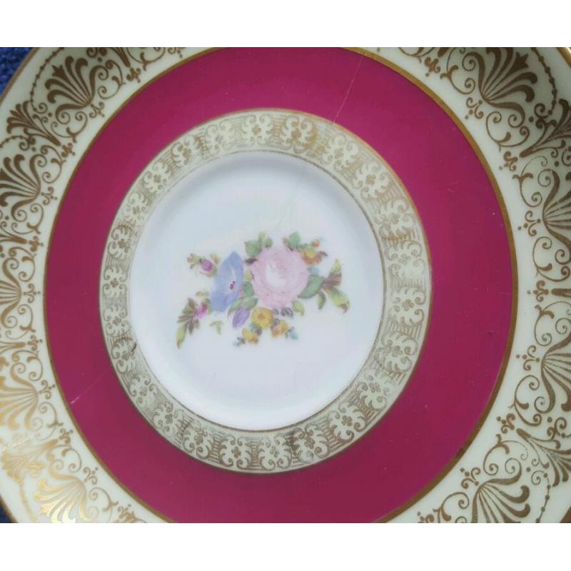 Assorted fine china plates different sizes