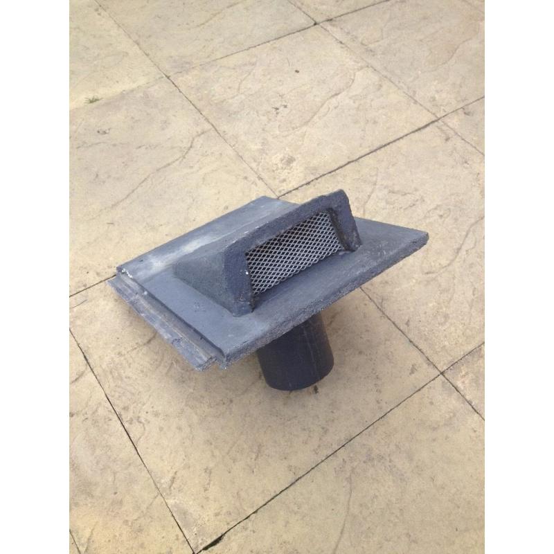 Roof vent tile, new.