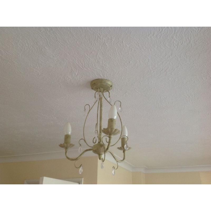 2 Chandelier ceiling lights ,3candle bulbs,+ 4 wall lights, 2 bulbs in each. Shabby chic style cream