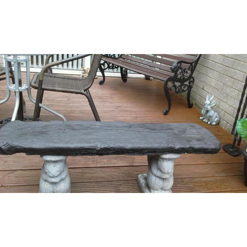 Concrete garden squirrel bench