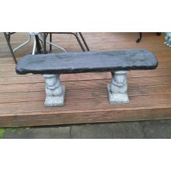 Concrete garden squirrel bench