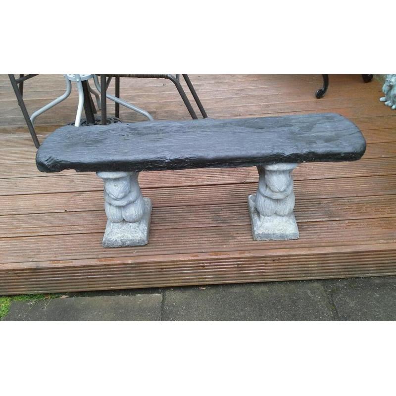 Concrete garden squirrel bench