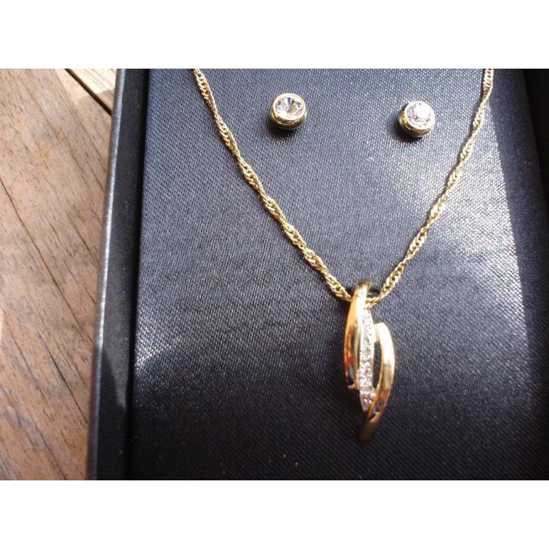 Marks & Spencers gold plated necklace & earring set