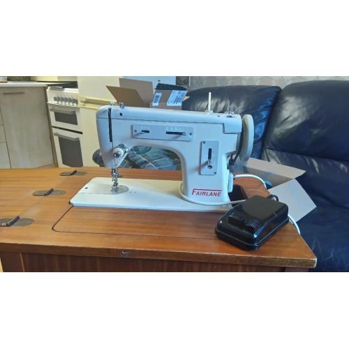 Sewing Machine with its own table.