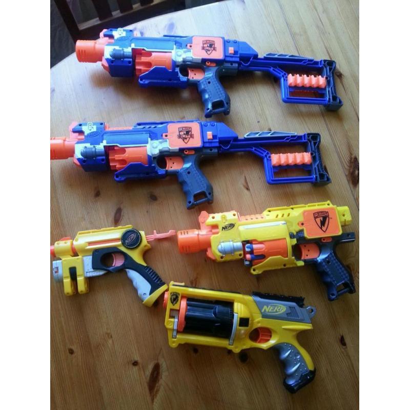 Collection of NERF guns and foam bullets