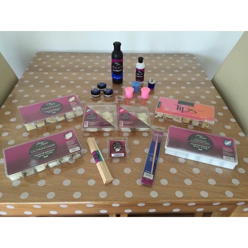 Selection of acrylic nail products and nail tips