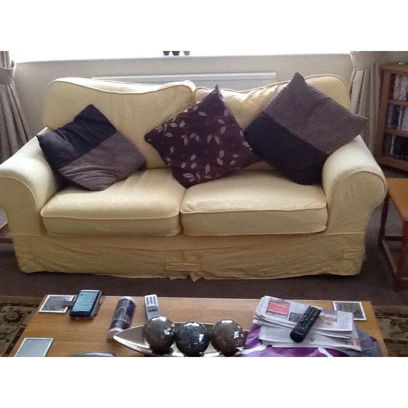 TWO IDENTICAL THREE SEATER SOFAS