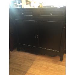 Modern Black narrow hall cupboard , could be used in any room .