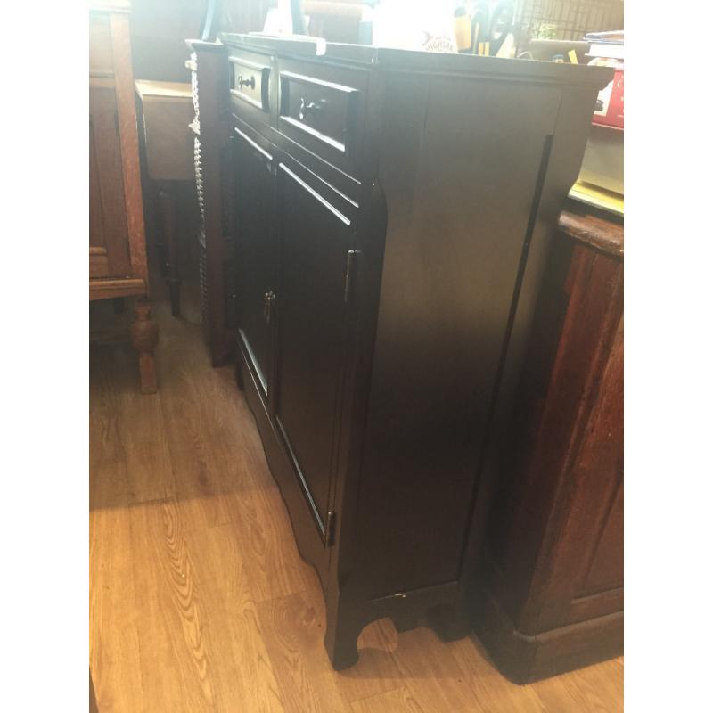 Modern Black narrow hall cupboard , could be used in any room .