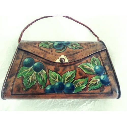 ANTIQUE TOFFEE TIN IN THE SHAPE OF A BAG