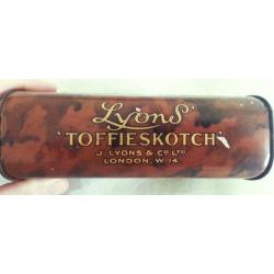 ANTIQUE TOFFEE TIN IN THE SHAPE OF A BAG