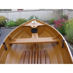 Sailing and rowing dinghy with trailer
