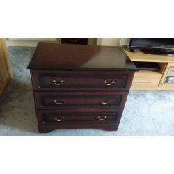 Three drawer bedside cabinet with a chest of drawers and matching headboard