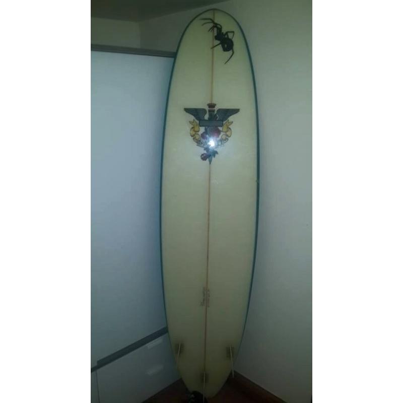 Safari Spider Surfboard 7'6" with a leash