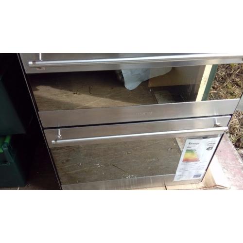 New and unused Smeg under counter multi function double oven