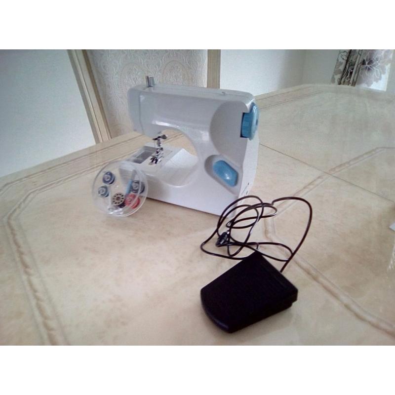 PORTABLE Double Thread SEWING MACHINE +Accessories. NOT USED.
