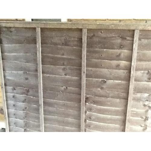 2 X brown wooden panel fence