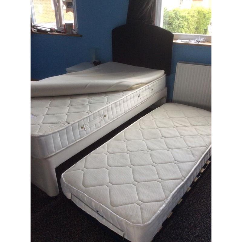Single bed with guest bed underneath