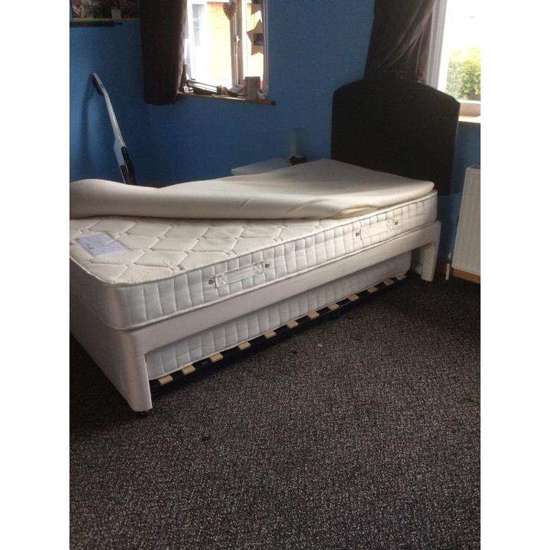 Single bed with guest bed underneath
