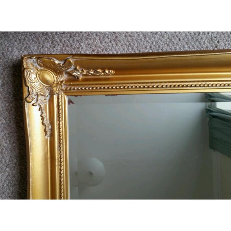 Large gold colour mirror