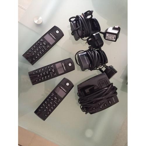 Triple home telephone set with answering machine