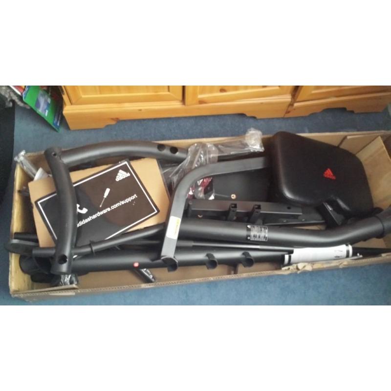 addidas Weight bench with barbell and weights