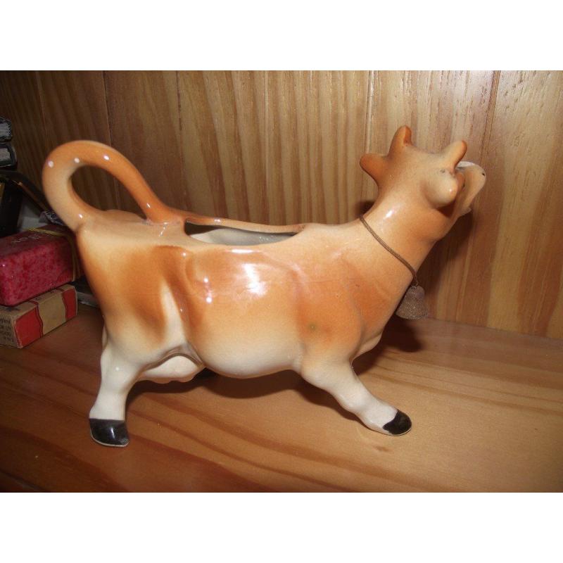 vintage cow creamer or milk jug