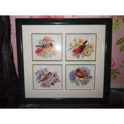Framed tapestry of birds