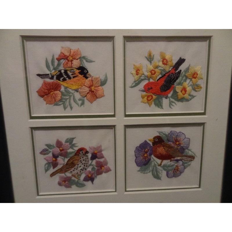 Framed tapestry of birds