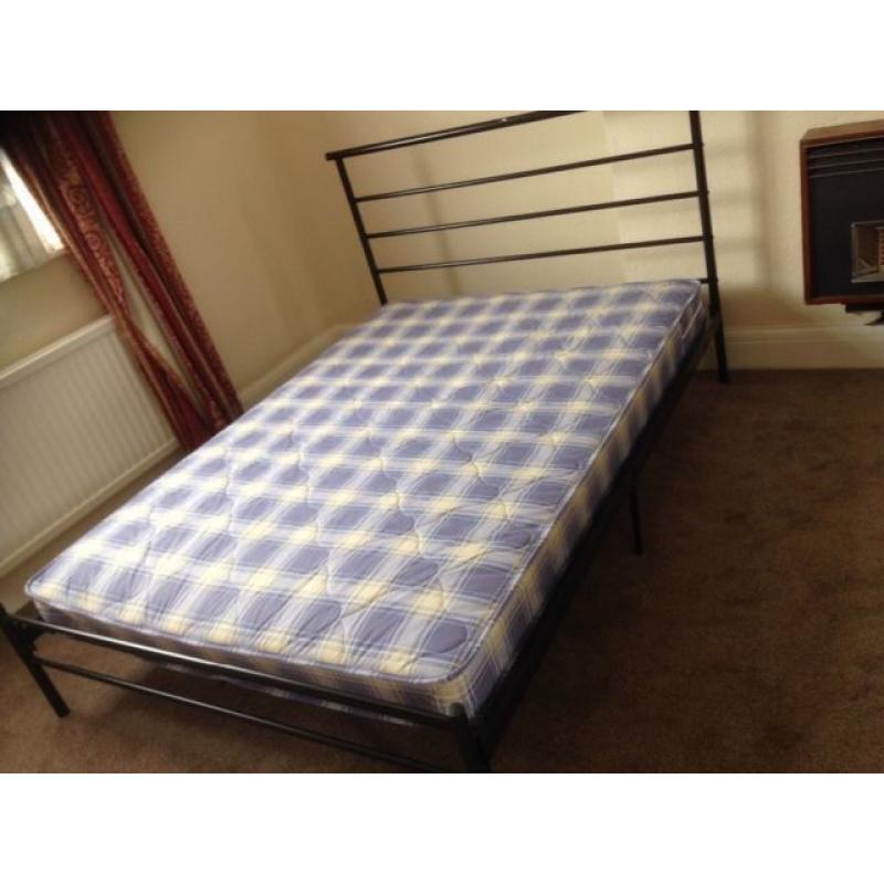 nice black metal double bed frame with good clean mattress
