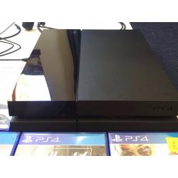 PS4 console and 5 games for sale plus a controller