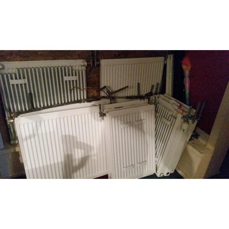 8 radiators - 6 single panels and 2 double panel