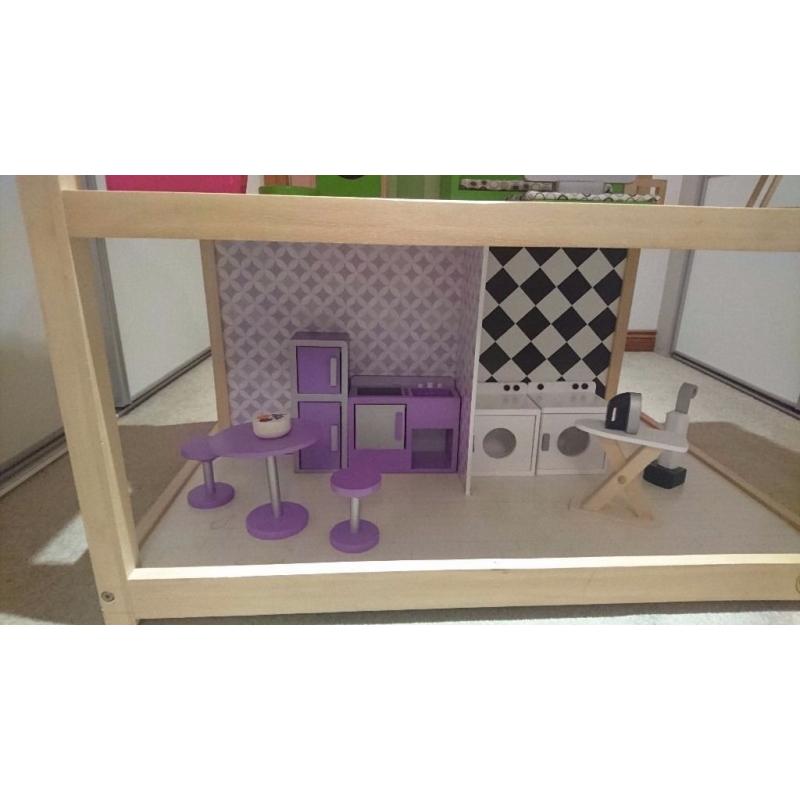 Large double sided dolls house on wheels with furniture