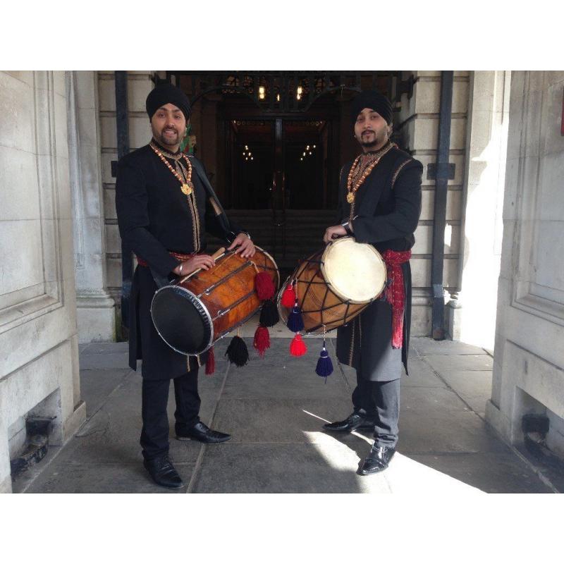 DHOL PLAYERS IN CARDIFF, SWANSEA, NEWPORT, SOUTH WALES - DRAGON DHOLIS INDIAN DRUMMERS