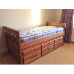 Single bed with pull out single bed, 2 mattresses and 3 drawers