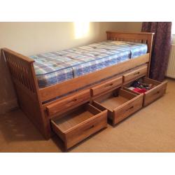 Single bed with pull out single bed, 2 mattresses and 3 drawers