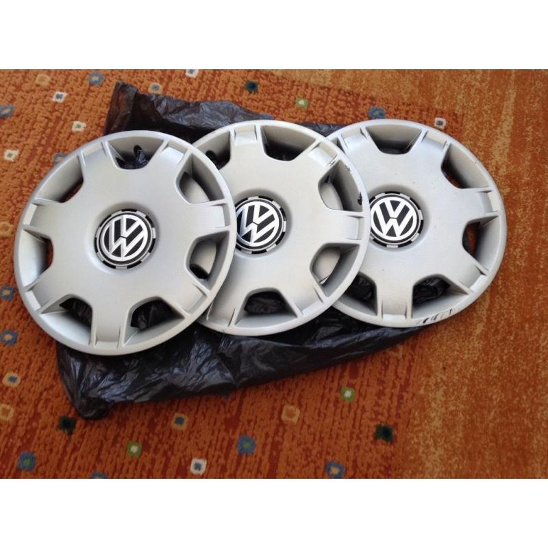 Three wheel trims fits vw polo fox golf 14 in ok condition.