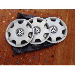 Three wheel trims fits vw polo fox golf 14 in ok condition.