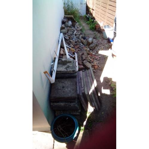 Rubble and patio slabs