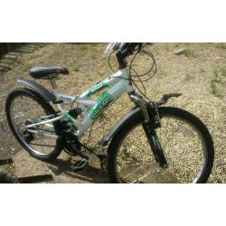 Raleigh 24 inch full susp bike.. LOOK. Excellent condition.