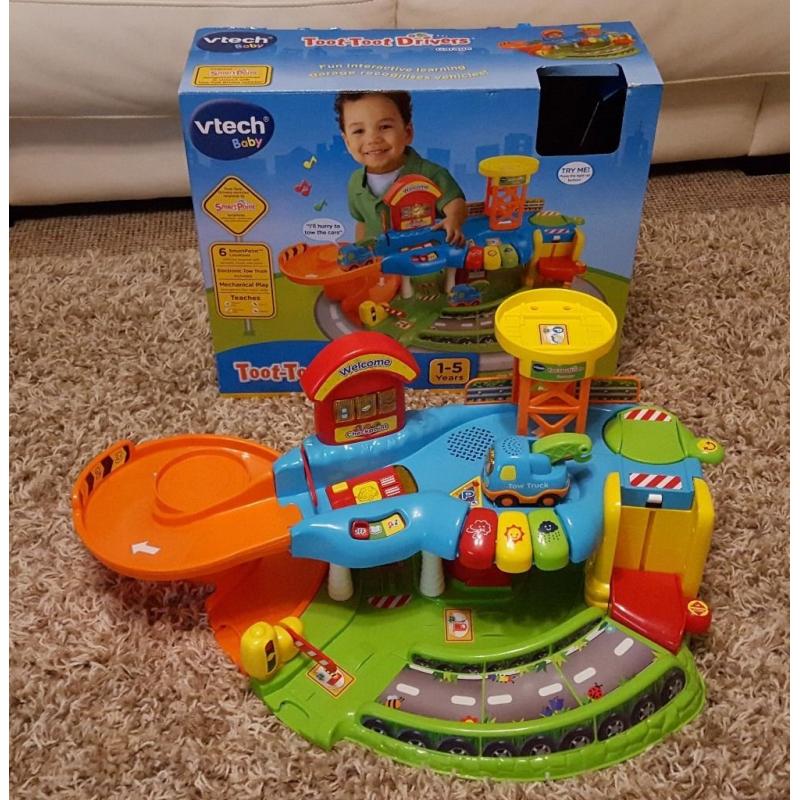 Vtech Toot Toot Drivers Garage - Immaculate condition with box and extra car (dumper truck)