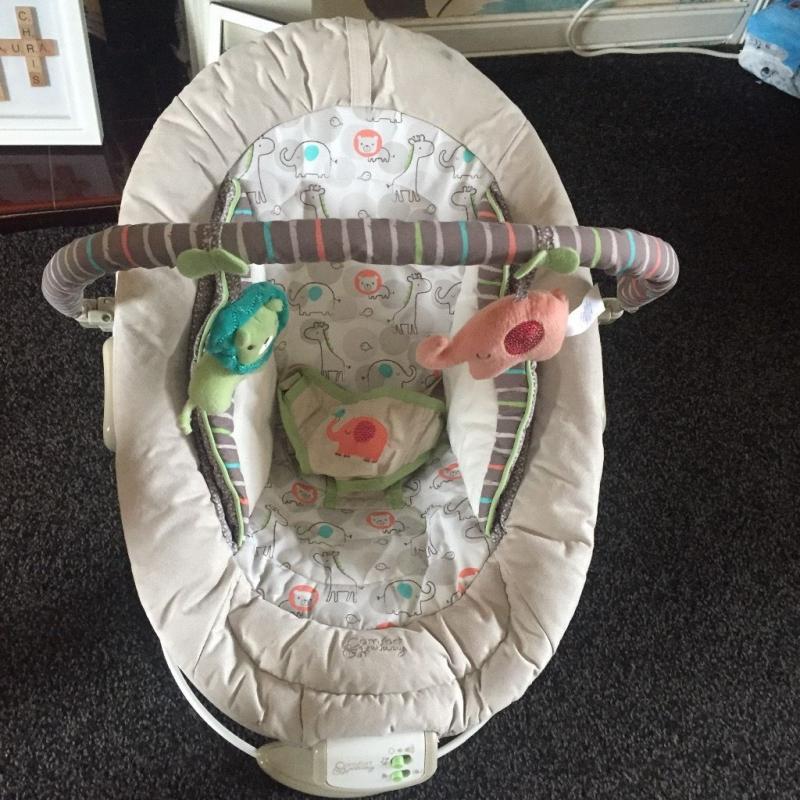 Baby bouncer in great condition. Vibrating and music settings to soothe baby. Neutral colours.