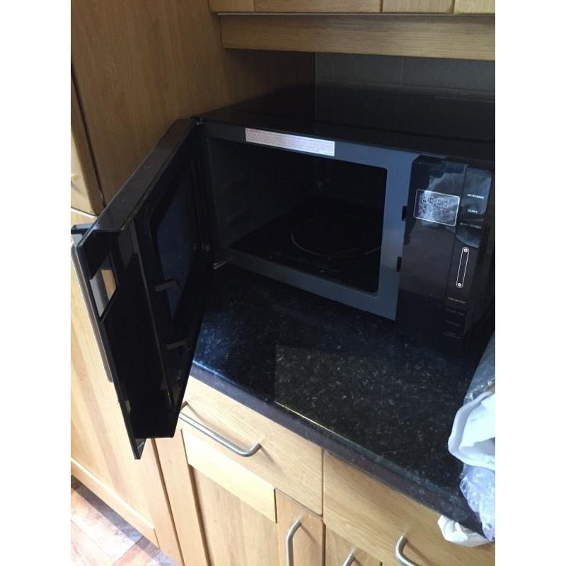 Brand New Delonghi Microwave