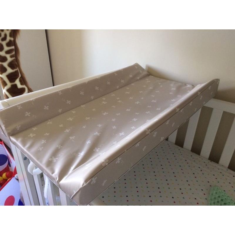 Over the cot changing mat