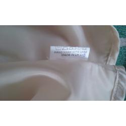 Dress and jacket with fascinator and size 8 shoes if required.