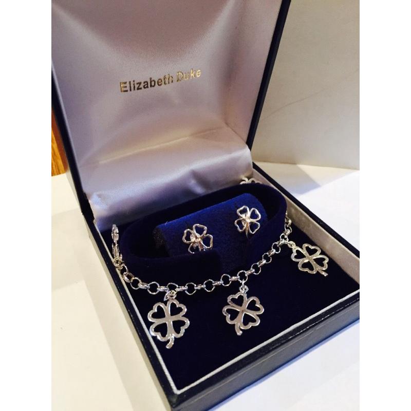 Brand new Silver lucky clover bracelet and earring set