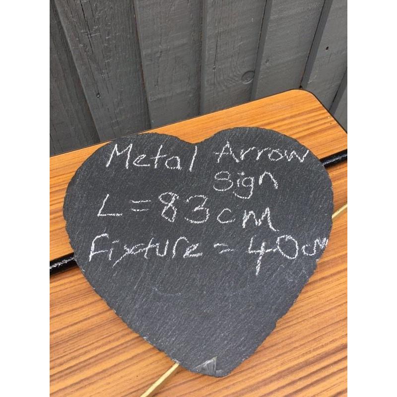 Quirky metal arrow sign pub restaurant advertising direction house name